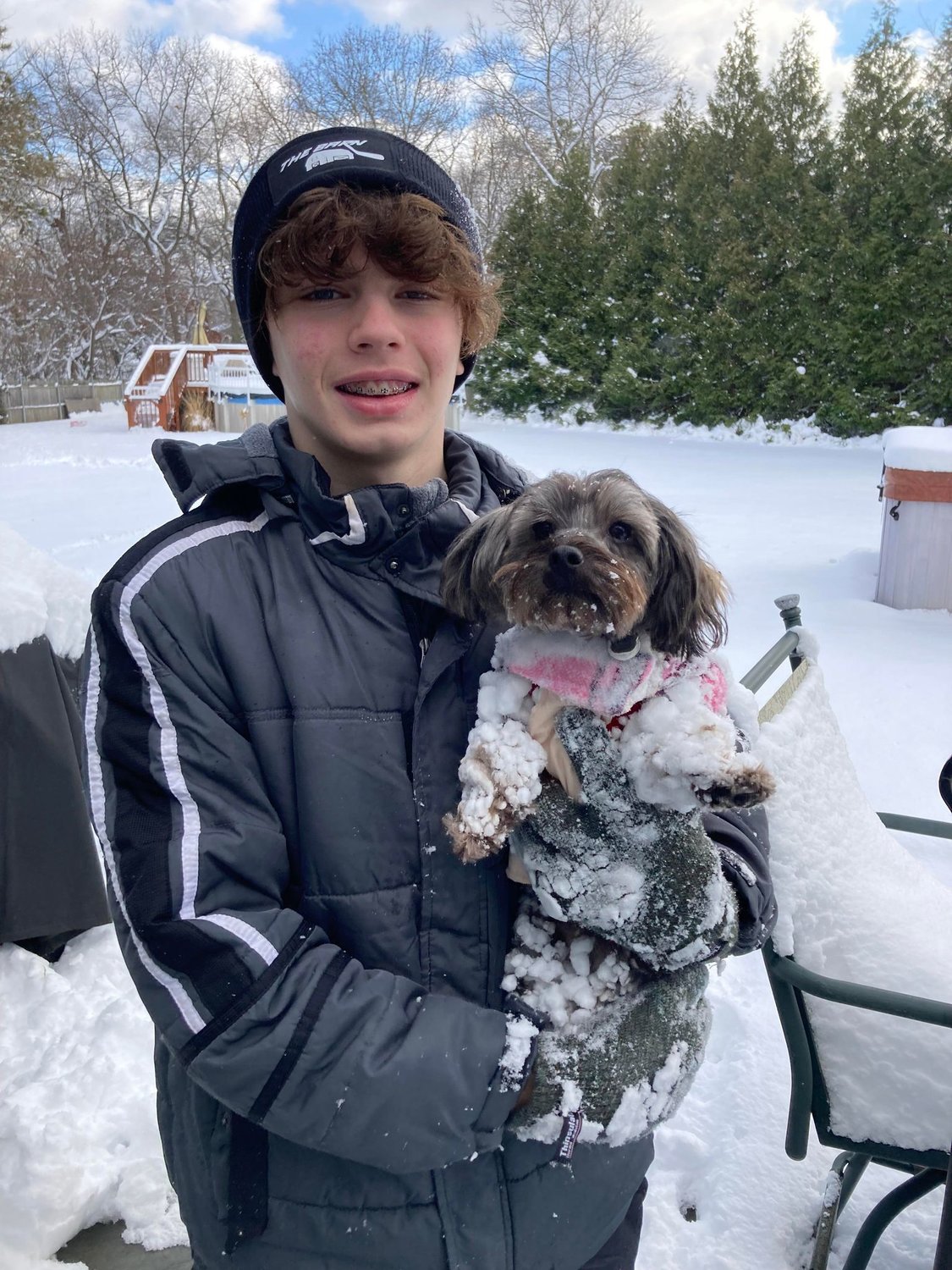 Justin Morrissey, 15, and Daisy Mae, 1-year-old Yorkie-poo, Patchogue